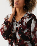 Petite Printed V Neck Ruffle Blouse